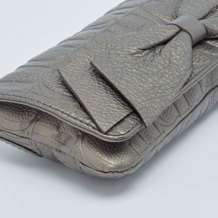 Pre Owned Carolina Herrera Metallic Monogram Embossed Leather Audrey Clutch