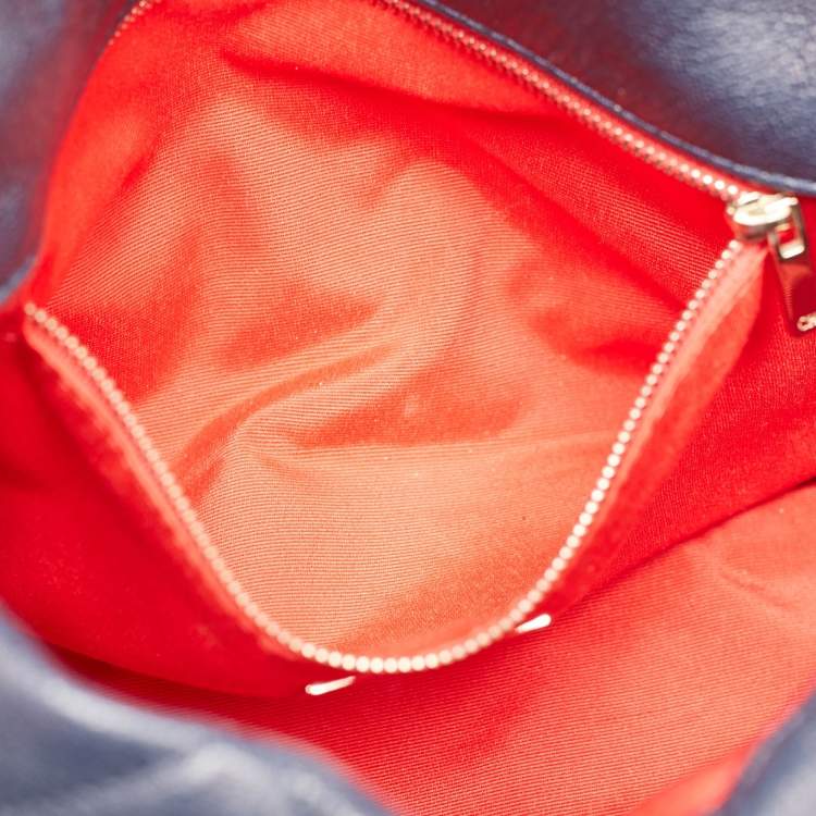 Pre Owned Carolina Herrera Navy Blue Logo Embossed Leather Metal Flap Shoulder Bag