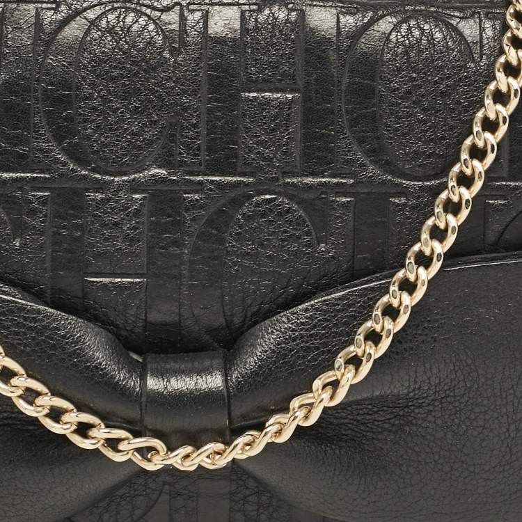 Pre Owned Carolina Herrera Black Monogram Embossed Leather Bow Flap Chain Clutch