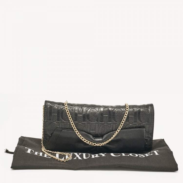 Pre Owned Carolina Herrera Black Monogram Embossed Leather Bow Flap Chain Clutch