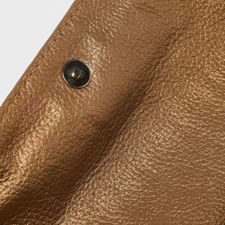 Pre Owned Carolina Herrera Gold Monogram Embossed Leather Audrey Chain Clutch