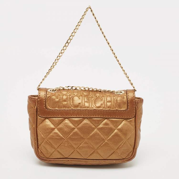 Pre Owned Carolina Herrera Gold Monogram Embossed Leather Bow Flap Chain Bag