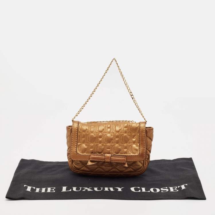 Pre Owned Carolina Herrera Gold Monogram Embossed Leather Bow Flap Chain Bag