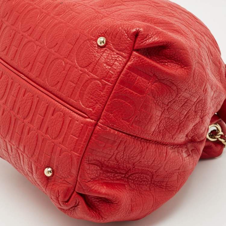 Pre Owned Carolina Herrera Red Monogram Embossed Leather Bow Bucket Shoulder Bag
