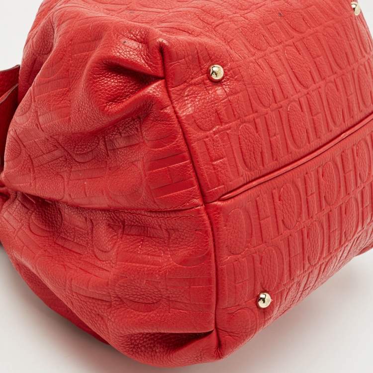 Pre Owned Carolina Herrera Red Monogram Embossed Leather Bow Bucket Shoulder Bag