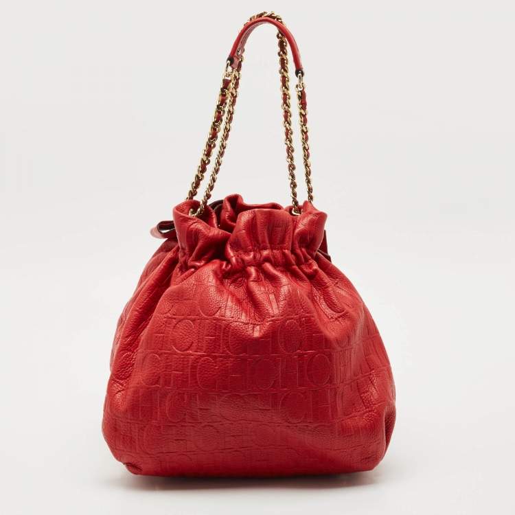 Pre Owned Carolina Herrera Red Monogram Embossed Leather Bow Bucket Shoulder Bag