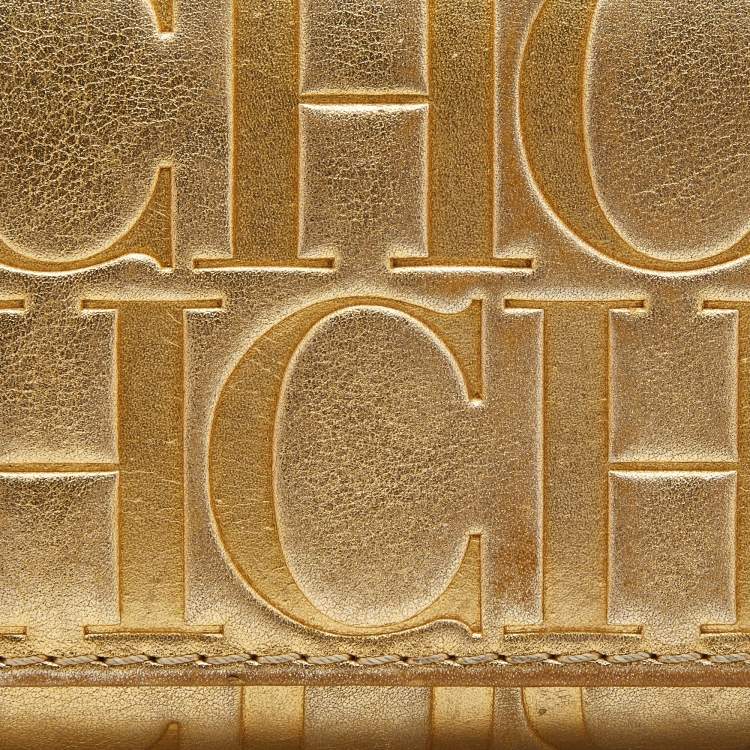 Pre Owned Carolina Herrera Gold Monogram Embossed Leather Tassel Flap Continental Wallet
