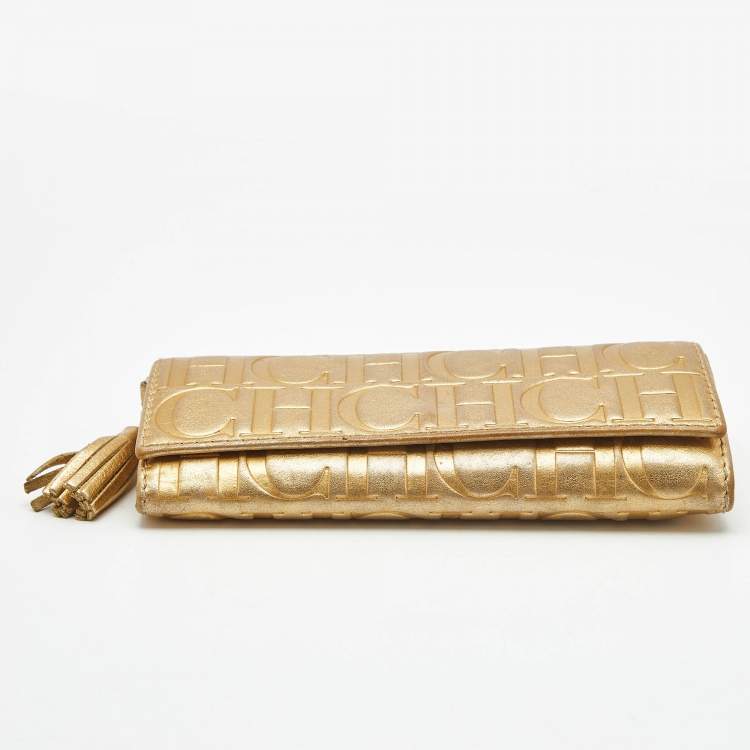 Pre Owned Carolina Herrera Gold Monogram Embossed Leather Tassel Flap Continental Wallet