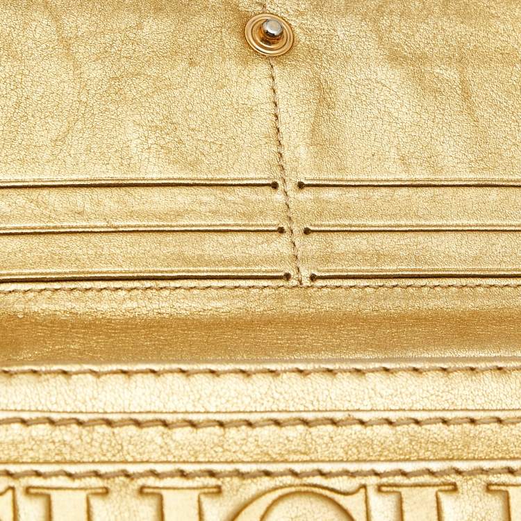 Pre Owned Carolina Herrera Gold Monogram Embossed Leather Tassel Flap Continental Wallet