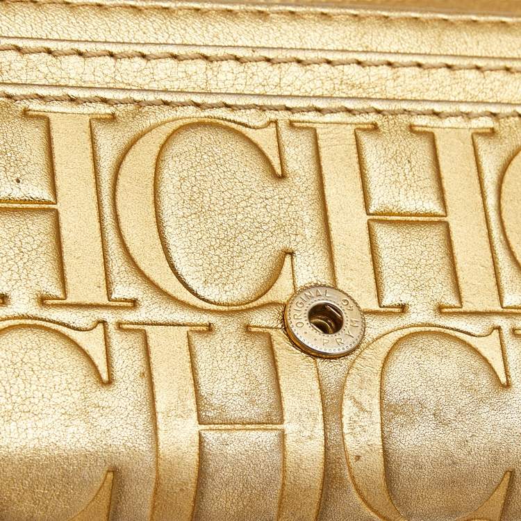 Pre Owned Carolina Herrera Gold Monogram Embossed Leather Tassel Flap Continental Wallet