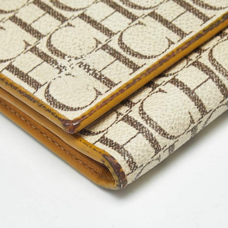 Pre Owned Carolina Herrera Off White Monogram Coated Canvas and Leather Trifold Continental Wallet