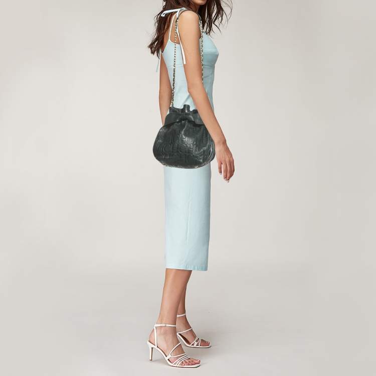 Pre Owned Carolina Herrera Dark Green Monogram Embossed Leather Bow Bucket Bag