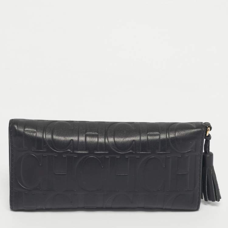 Pre Owned Carolina Herrera Black Monogram Embossed Leather Tassel Trifold Continental Wallet