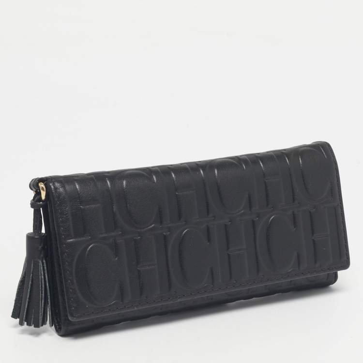 Pre Owned Carolina Herrera Black Monogram Embossed Leather Tassel Trifold Continental Wallet