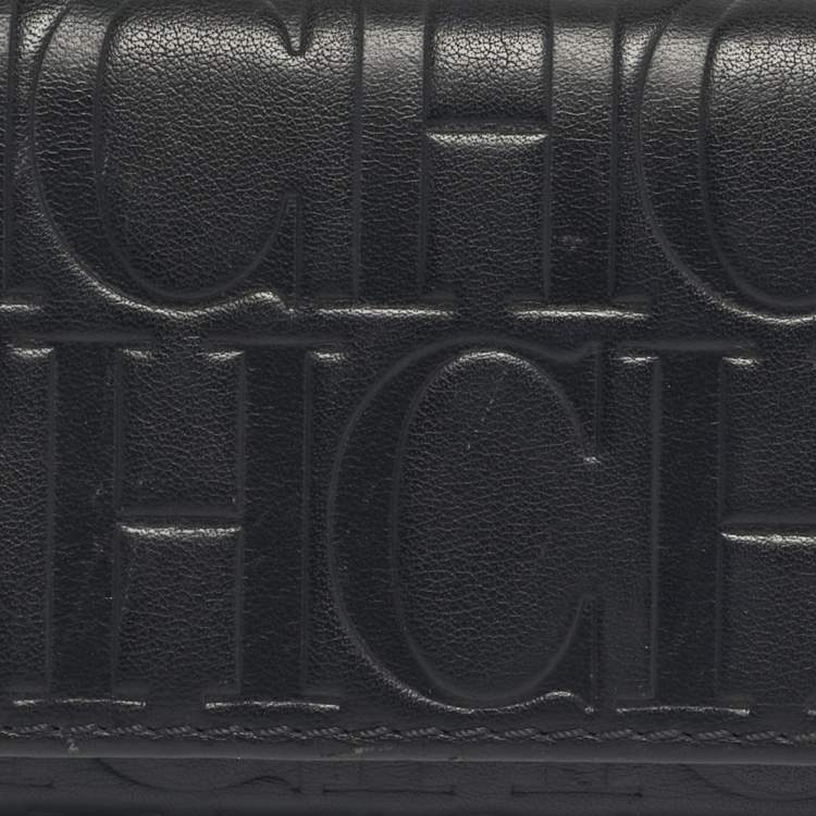 Pre Owned Carolina Herrera Black Monogram Embossed Leather Tassel Trifold Continental Wallet