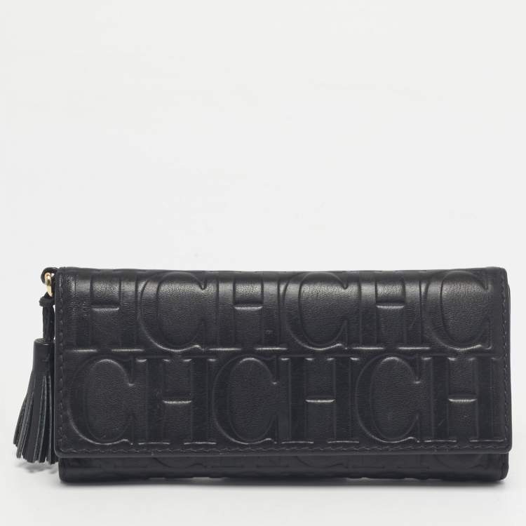 Pre Owned Carolina Herrera Black Monogram Embossed Leather Tassel Trifold Continental Wallet