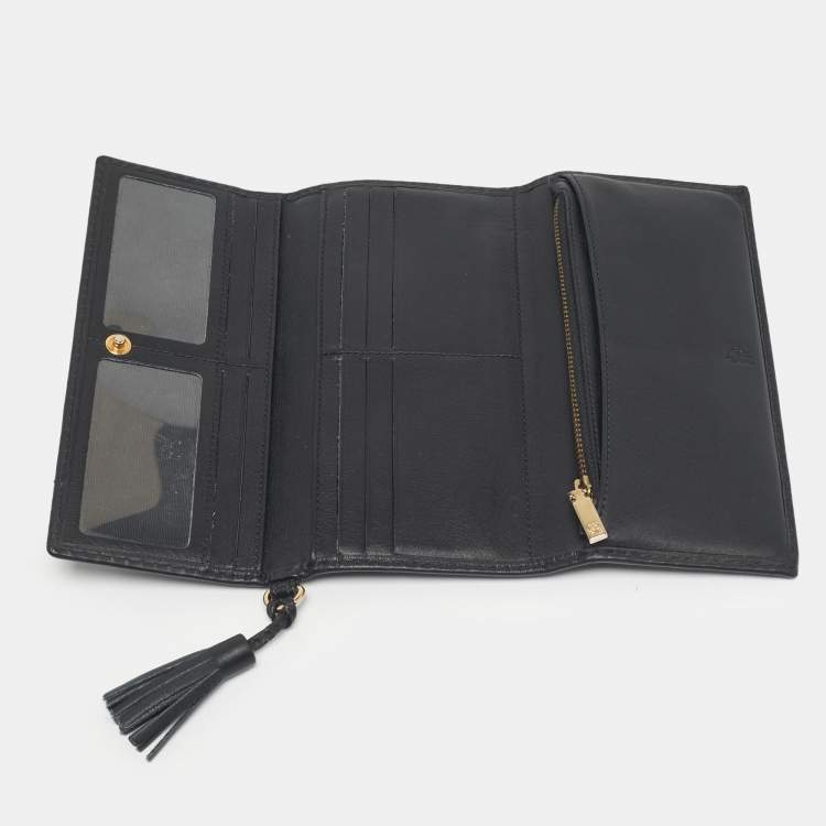 Pre Owned Carolina Herrera Black Monogram Embossed Leather Tassel Trifold Continental Wallet