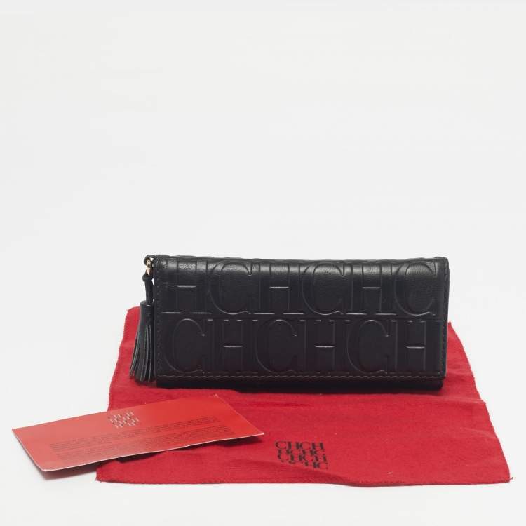 Pre Owned Carolina Herrera Black Monogram Embossed Leather Tassel Trifold Continental Wallet