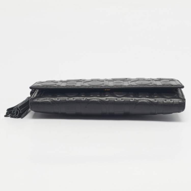 Pre Owned Carolina Herrera Black Monogram Embossed Leather Tassel Trifold Continental Wallet