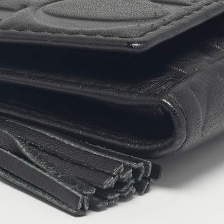 Pre Owned Carolina Herrera Black Monogram Embossed Leather Tassel Trifold Continental Wallet