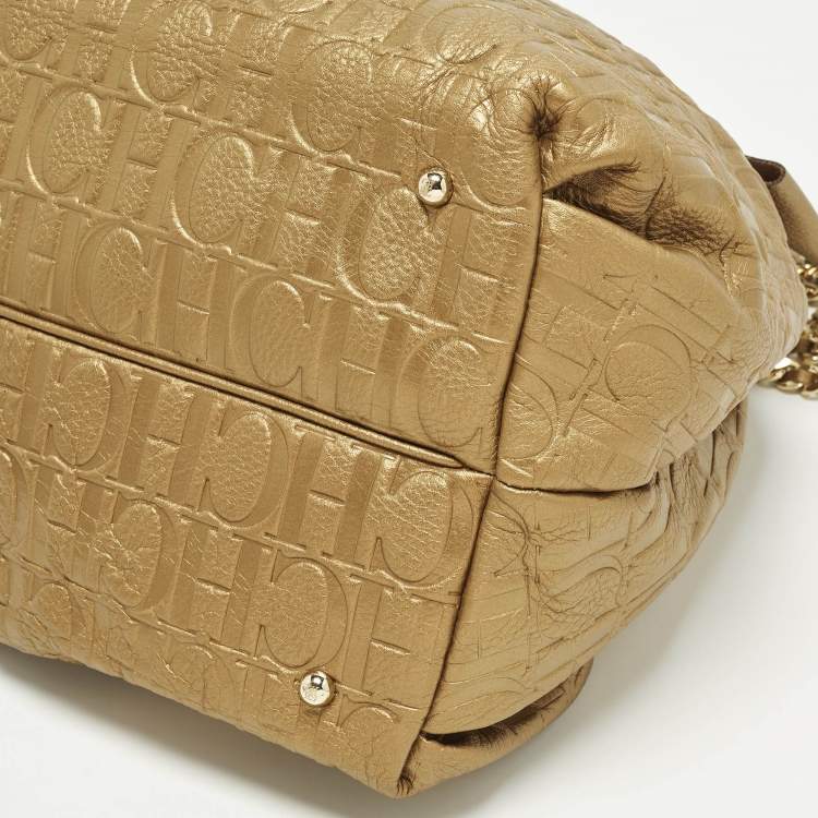 Pre Owned Carolina Herrera Bow Gold Monogram Embossed Leather Bucket Bag