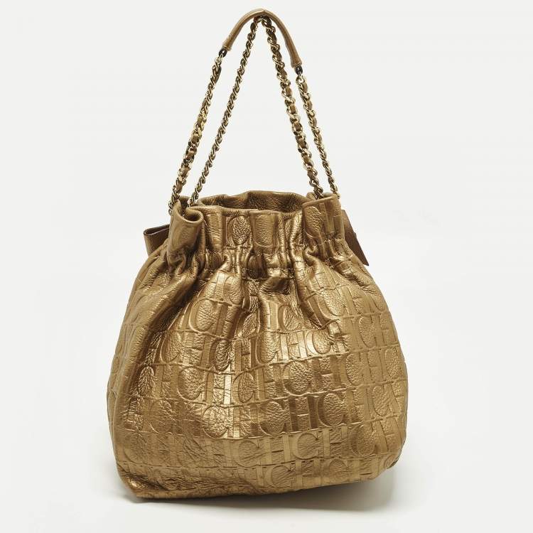 Pre Owned Carolina Herrera Bow Gold Monogram Embossed Leather Bucket Bag