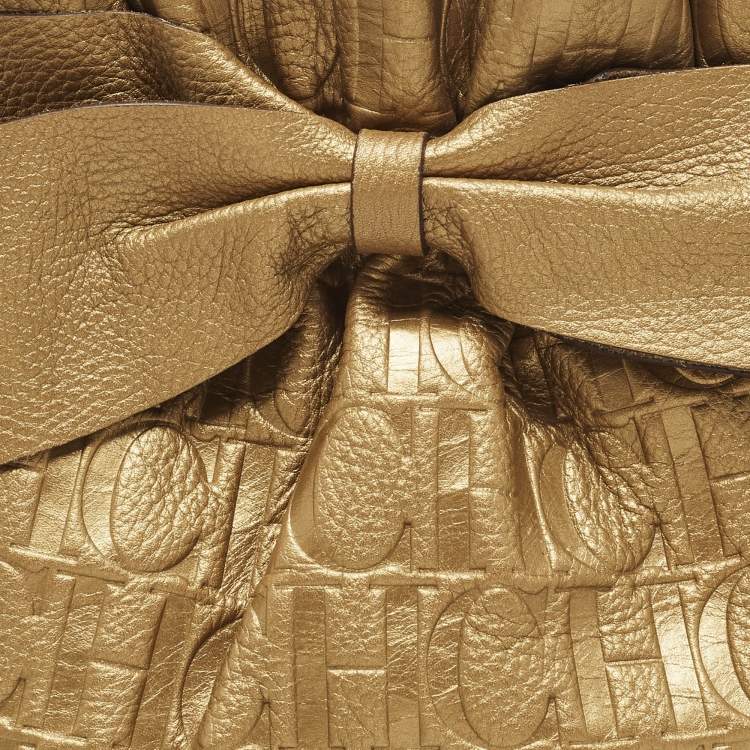 Pre Owned Carolina Herrera Bow Gold Monogram Embossed Leather Bucket Bag