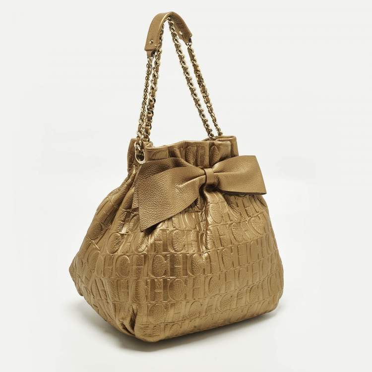 Pre Owned Carolina Herrera Bow Gold Monogram Embossed Leather Bucket Bag