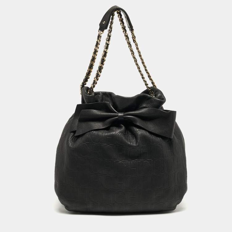 Pre Owned Carolina Herrera Bow Black Monogram Embossed Leather Bucket Bag