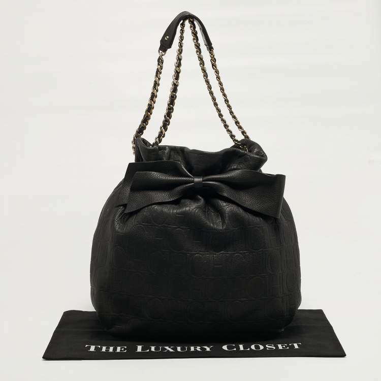 Pre Owned Carolina Herrera Bow Black Monogram Embossed Leather Bucket Bag