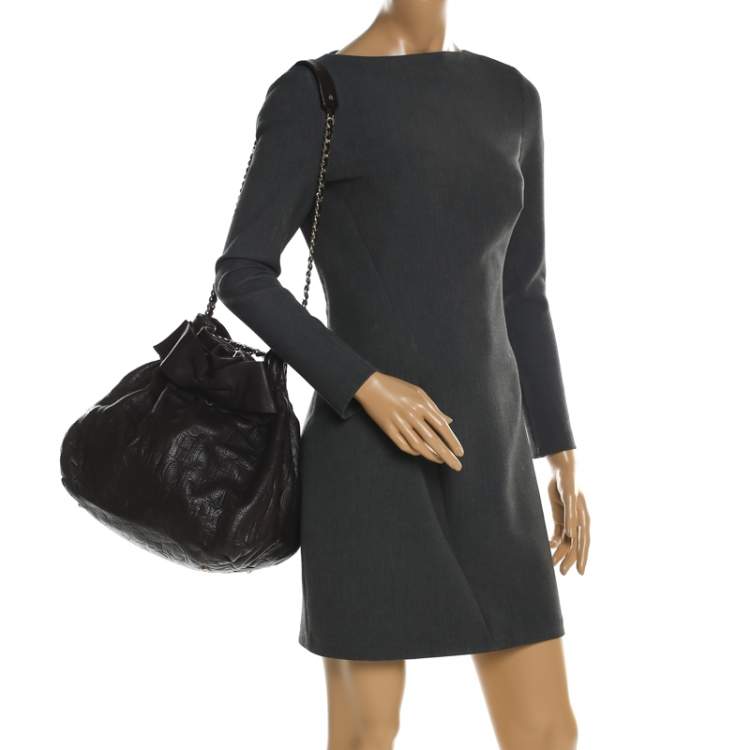 Pre Owned Carolina Herrera Dark Brown Monogram Embossed Leather Bow Bucket Shoulder Bag