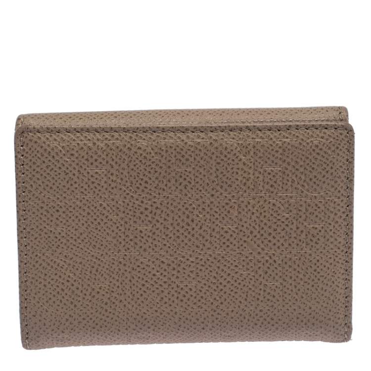 Pre Owned Carolina Herrera Beige Monogram Embossed Leather French Flap Wallet