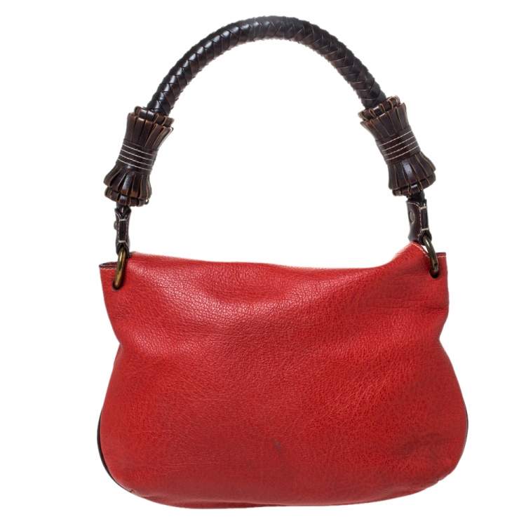 Pre Owned Carolina Herrera Orange/Brown logo Leather Braided Handle Hobo