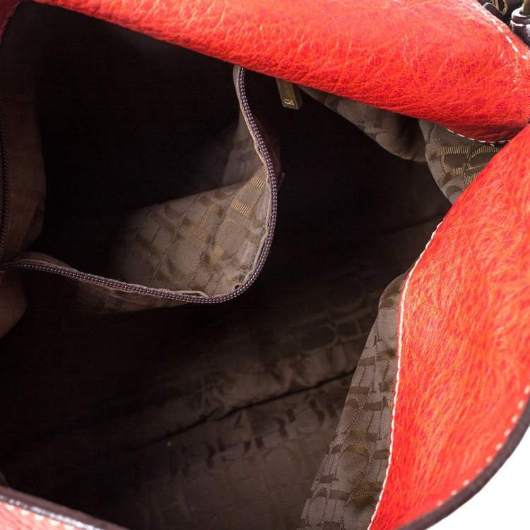 Pre Owned Carolina Herrera Orange/Brown logo Leather Braided Handle Hobo