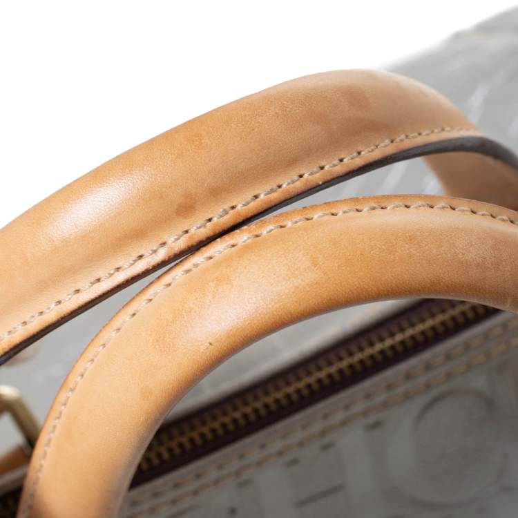 Pre Owned Carolina Herrera Metallic Silver Monogram Embossed Leather Andy Boston Bag