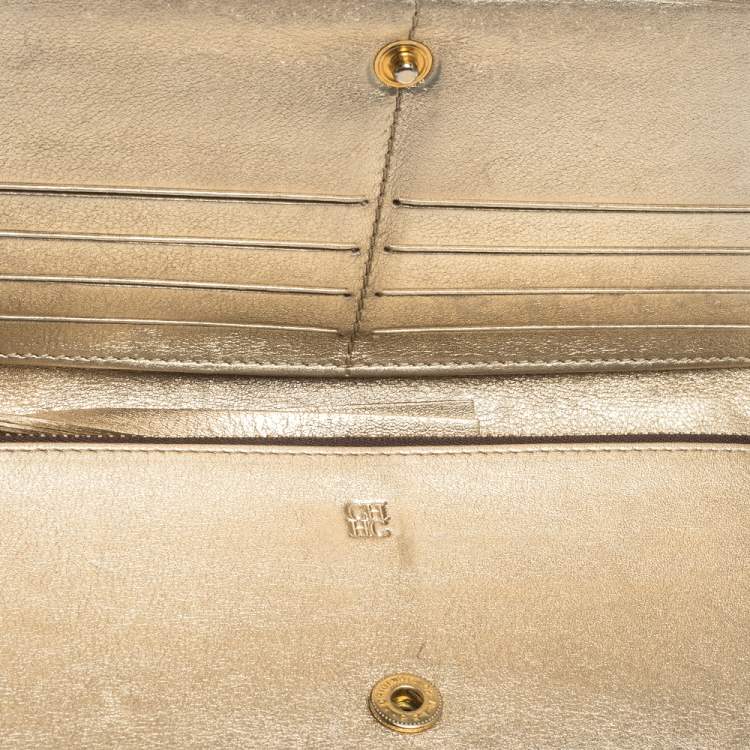 Pre Owned Carolina Herrera Metallic Gold Floral Embossed Leather Bifold Continental Wallet