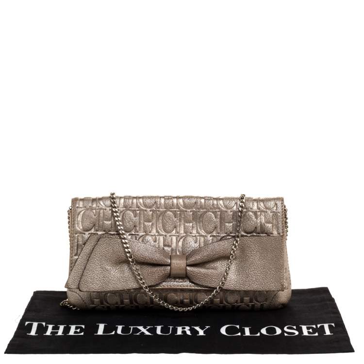 Pre Owned Carolina Herrera Gold Monogram Leather Bow Chain Clutch