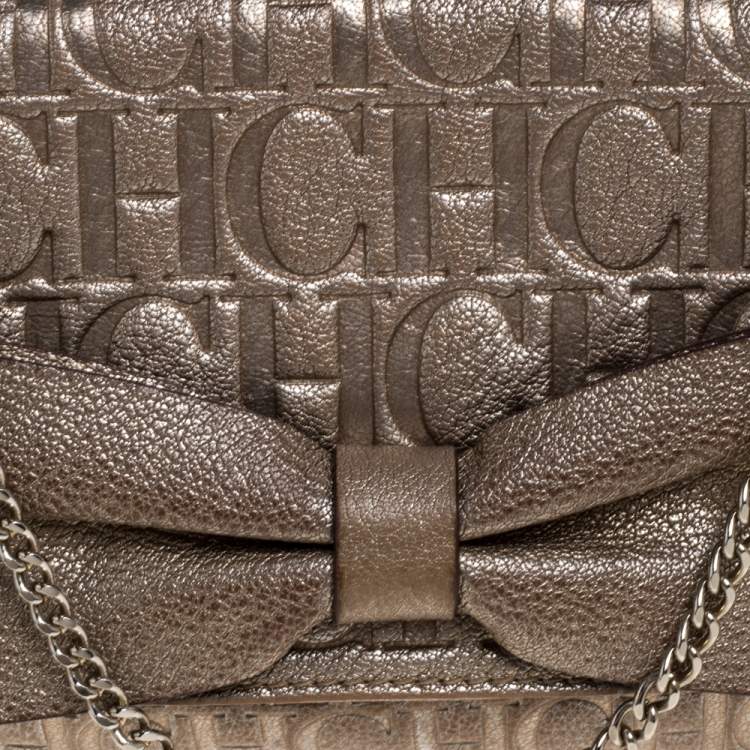 Pre Owned Carolina Herrera Gold Monogram Leather Bow Chain Clutch