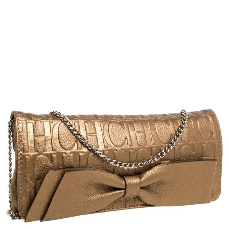 Pre Owned Carolina Herrera Gold Monogram Embossed Leather Bow Shoulder Bag