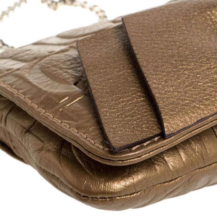 Pre Owned Carolina Herrera Gold Monogram Embossed Leather Bow Shoulder Bag