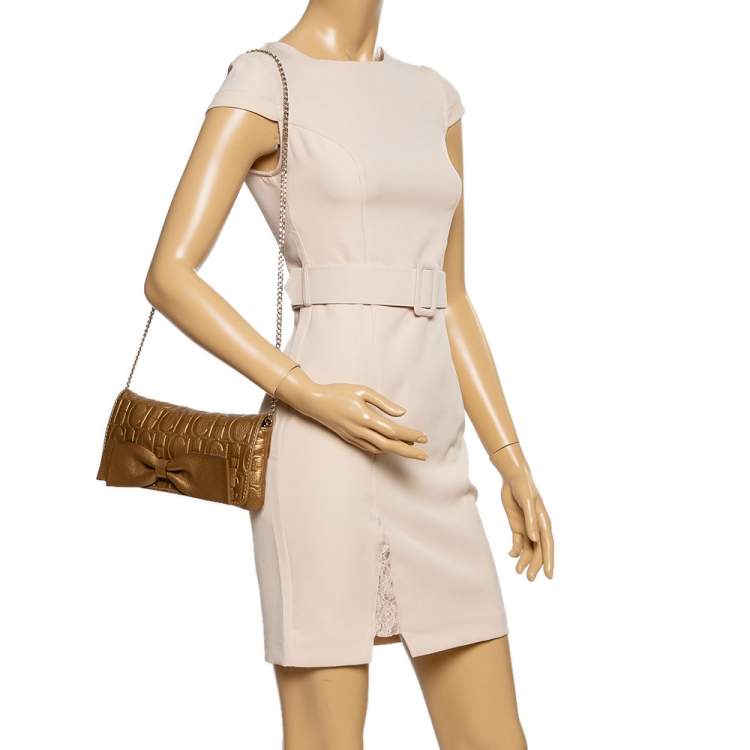 Pre Owned Carolina Herrera Gold Monogram Embossed Leather Bow Shoulder Bag