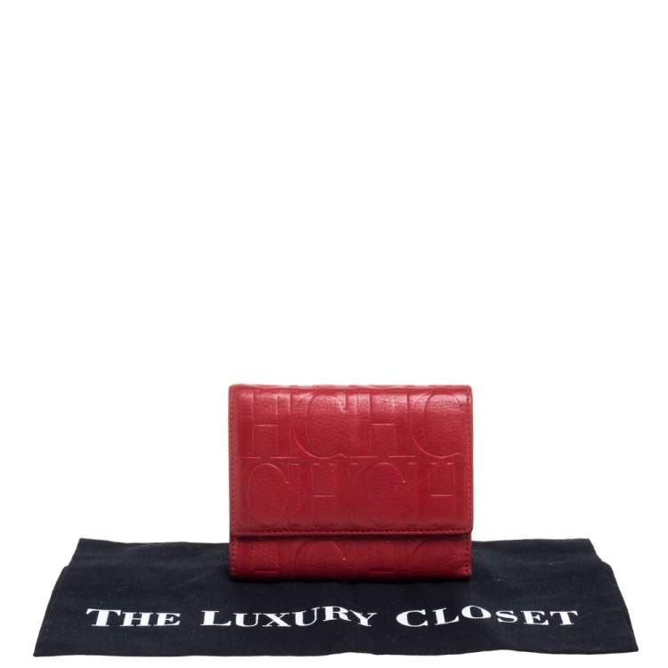 Pre Owned Carolina Herrera Red Monogram Embossed Leather Trifold Wallet