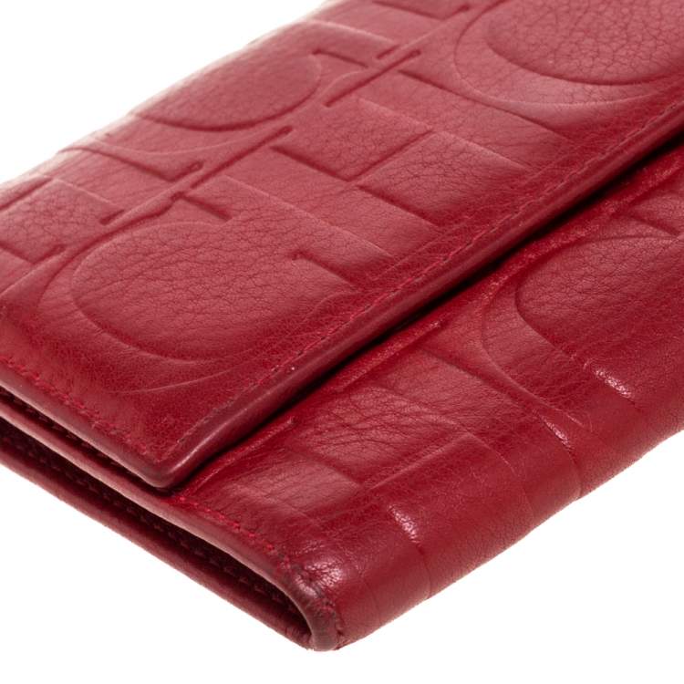 Pre Owned Carolina Herrera Red Monogram Embossed Leather Trifold Wallet