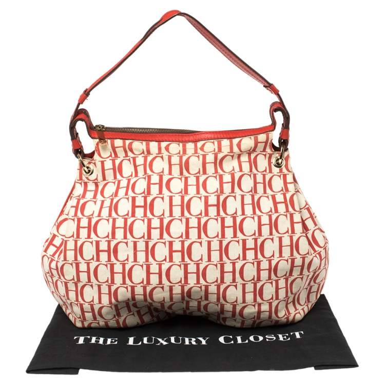 Pre Owned Carolina Herrera Red Signature Canvas and Leather Double Strap Hobo