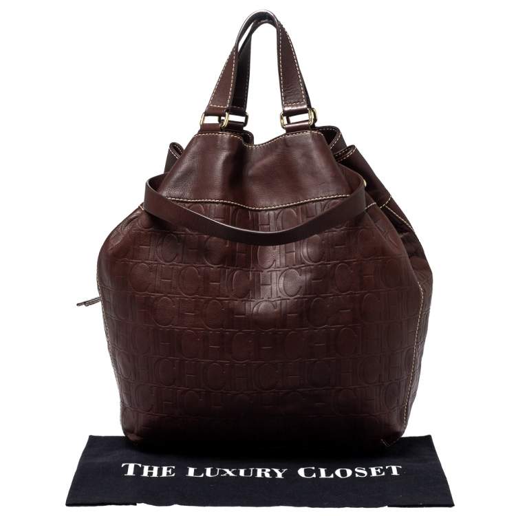 Pre Owned Carolina Herrera Dark Brown Monogram Embossed Leather Drawstring Oversized Tote