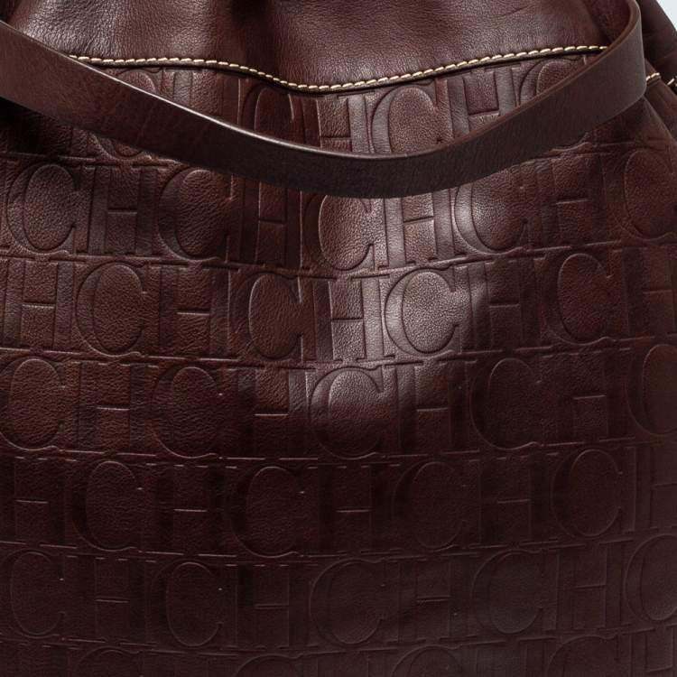 Pre Owned Carolina Herrera Dark Brown Monogram Embossed Leather Drawstring Oversized Tote
