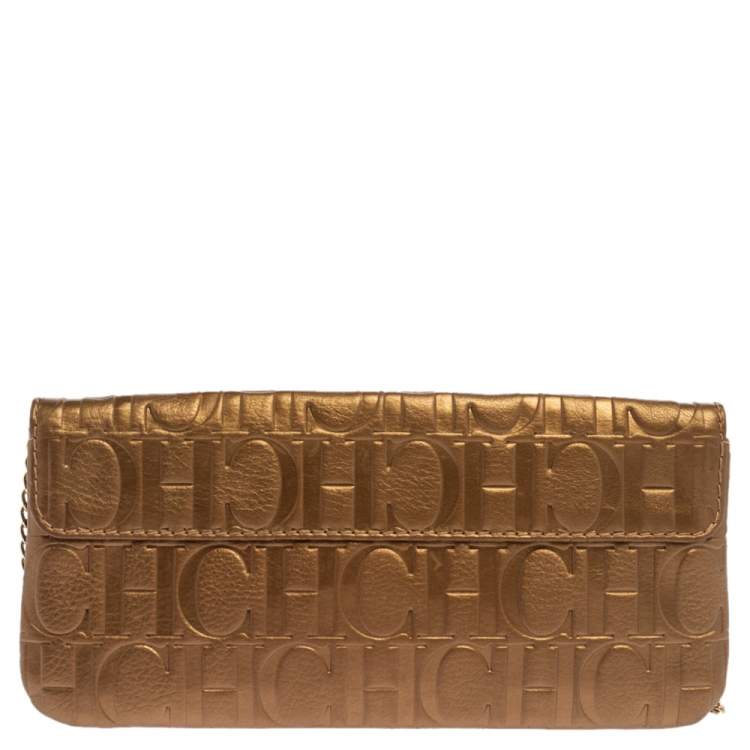 Pre Owned Carolina Herrera Gold Monogram Embossed Leather Bow Chain Clutch
