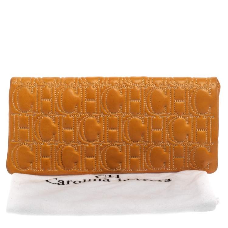 Pre Owned Carolina Herrera Mustard Monogram Embossed Leather Flap Clutch