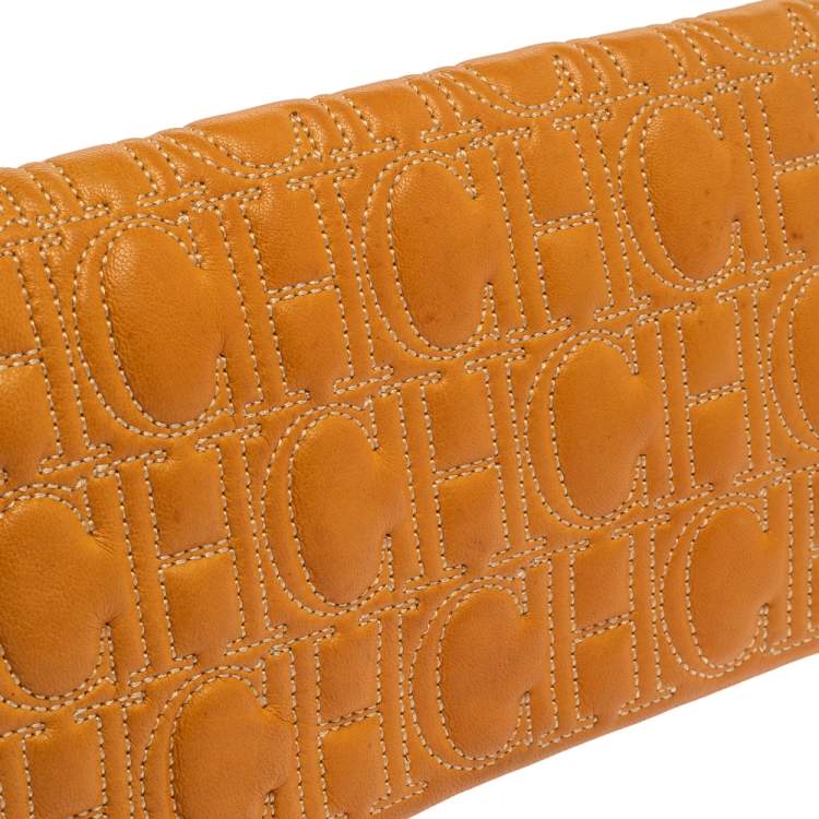 Pre Owned Carolina Herrera Mustard Monogram Embossed Leather Flap Clutch