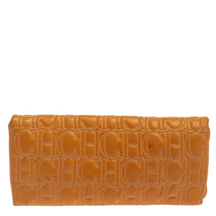 Pre Owned Carolina Herrera Mustard Monogram Embossed Leather Flap Clutch